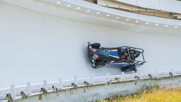A group of people on a track at the Mt Van Hoevenberg Bobsled Experience