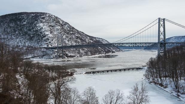 Aerial view of the Bear Mountain Bridge in the snow