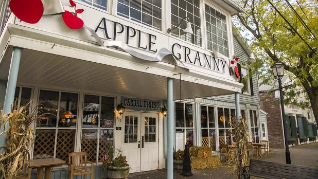 Hay bales and corn stalks dot the exterior of the cozy Apple Granny restaurant in Lewiston