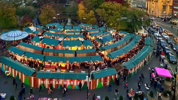 Aerial view of colorful pop-up shops with green roofs in Union Square
