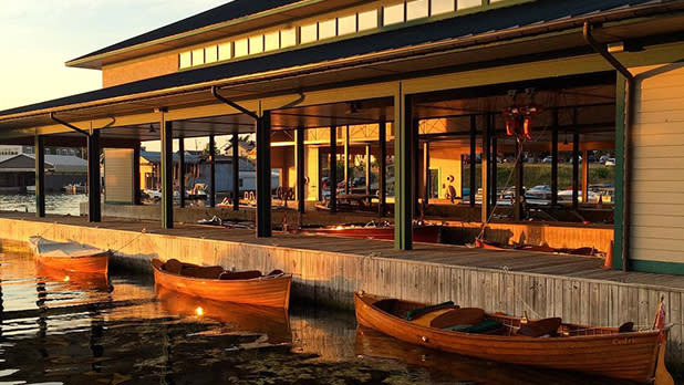 Three canoes docked at sunset at the Antique Boat Museum in Clayton.