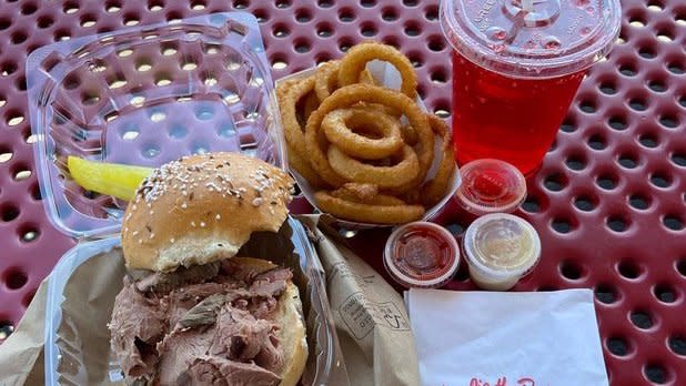Beef on weck, onion rings, and a loganberry