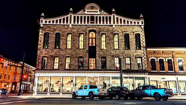 The facade of Bents Opera House at night