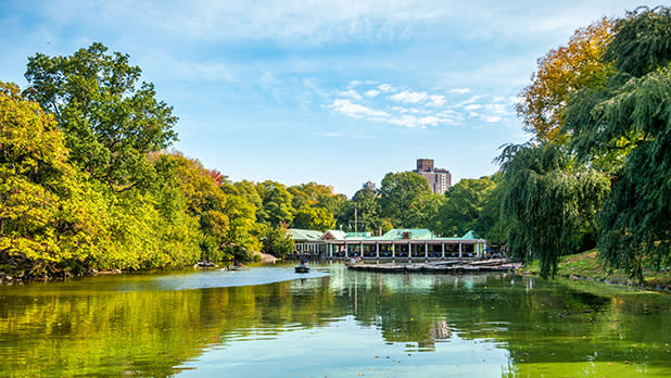 View of the Boathouse in Central Park across the lake in summer
