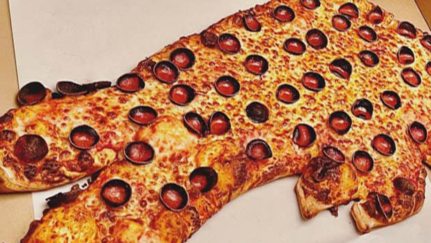 Pepperoni pizza shaped like a the Buffalo Bill logo
