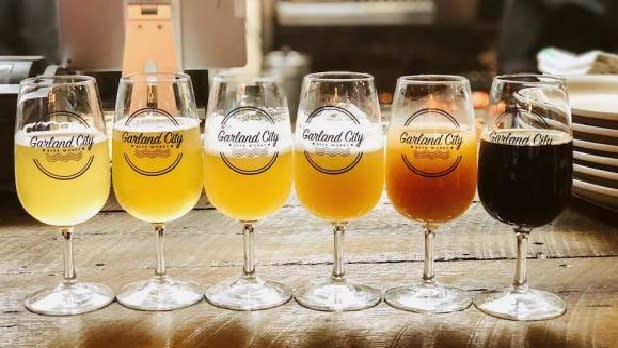 Line of Garland City beers in order from light to dark