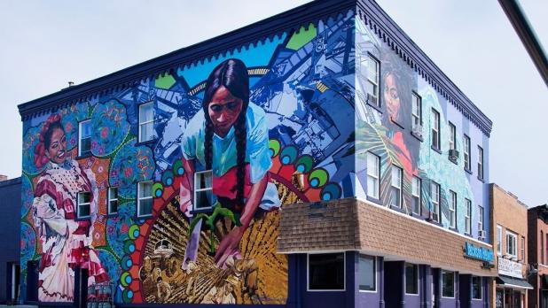 A vibrant mural on the side of a building in Buffalo, NY
