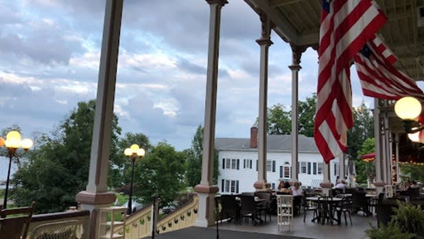 Exterior of tables on the front patio of the Heirloom restaurants