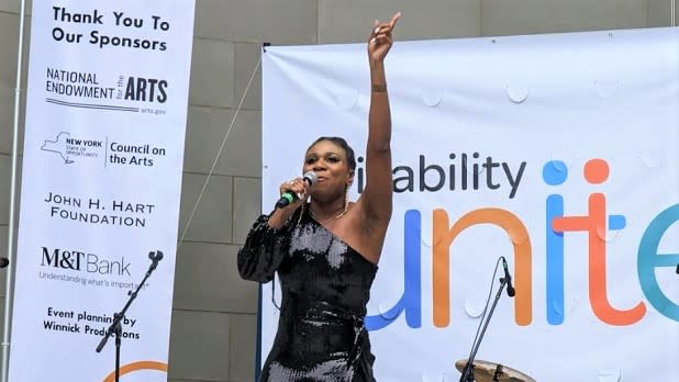 Lachi, an award-winning blind artist, performs at stage at Central Park during the Disability Unite Festival
