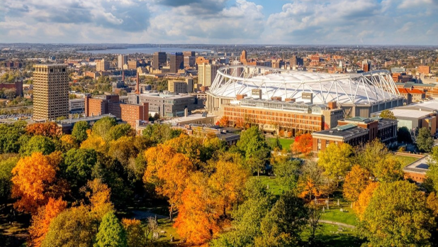 Aerial view of the JMA Wireless Dome in Syracuse surrounded by fall foliage
