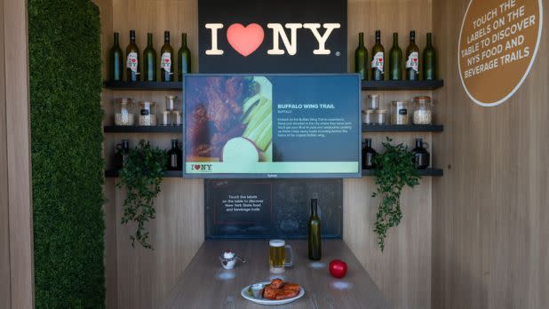 An artisanal deli display providing information about food at the I LOVE NY Experience