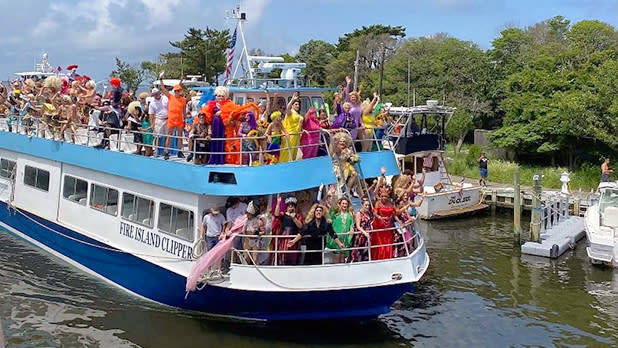 Drag queens wave as they arrive aboard the Fire Island Clipper for the annual Fire Island Invasion