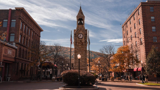 The clock tower landmark made of locally-sourced Antrim stone in Centerway Square in Downtown Corning.