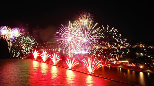 Starburst fireworks light up the sky at Oswego Harborfest