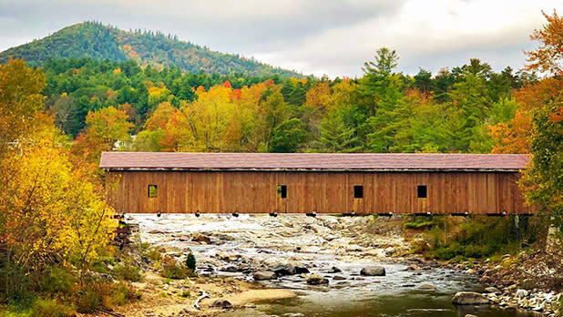 Glorious fall colors emerge around the Jay Covered Bridge perched atop the mighty Ausable River