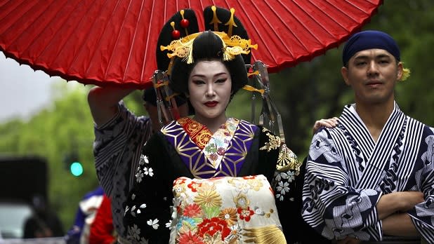 A woman in traditional Japanese clothing at the Japan Day Parade in New York City