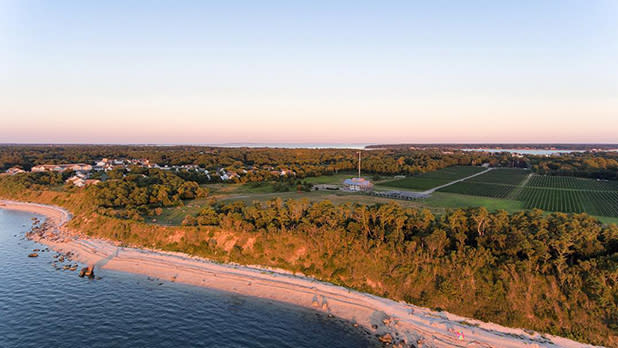 Fall colors line the shore near Kontokosta Winery