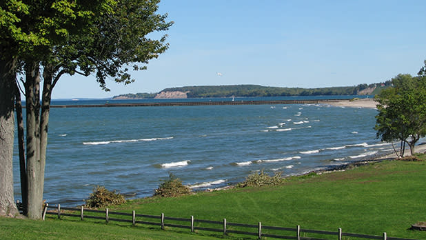 Lake Ontario shoreline on a clear blue skied day