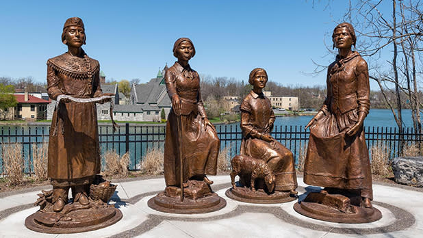 Four bronze sculptures depicting  Laura Cornelius Kellogg, Harriet Tubman, Martha Coffin Wright, and Sojourner Truth