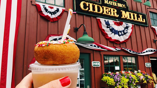 A donut tops a cider slushy at Mayer Brothers Cider Mill