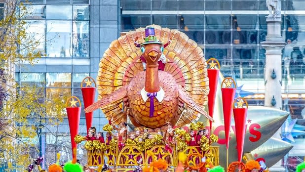 Tom the Turkey float makes its way along the Macy's Thanksgiving Day Parade Route