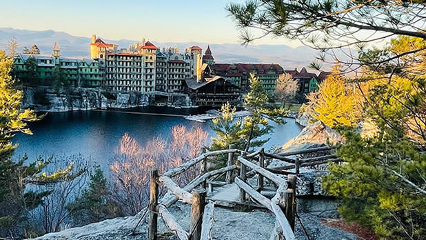 The view of Mohonk Mountain House lodge from across the lake in winter
