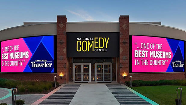 The Front Of The National Comedy Center Building'S Staircase And Displays