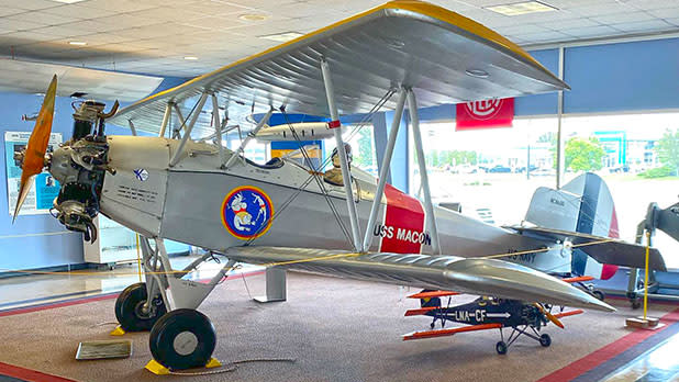 Grey vintage plane with red and blue stickers on display at the Niagara Aerospace Museum