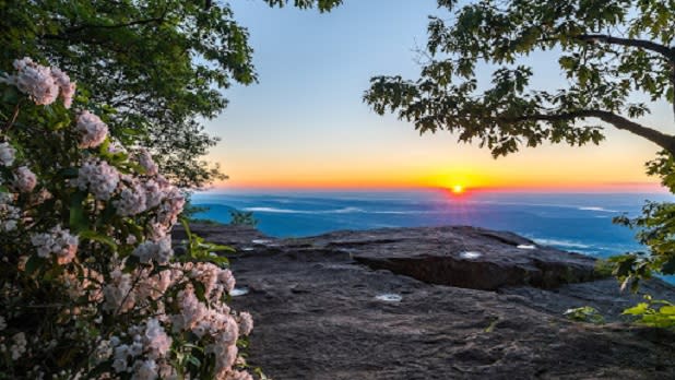 Cliff looking out at a sunrise