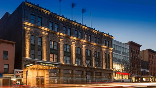 Exterior of Opera House Hotel at dusk