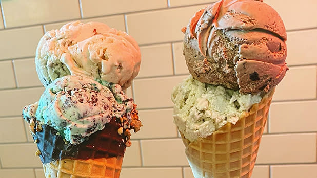 Two waffle cones with double scoops of ice cream from Purity Ice Cream Co. in Ithaca