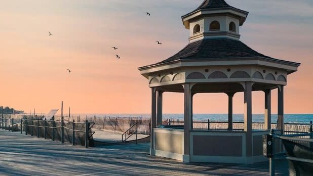 Photo of the gazebo and sand shoreline from the boardwalk at Ontario beach state park