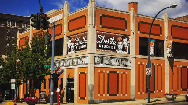 Orange building for Desilu Studios with a photo of Lucille Ball and Desi Arnaz on the side