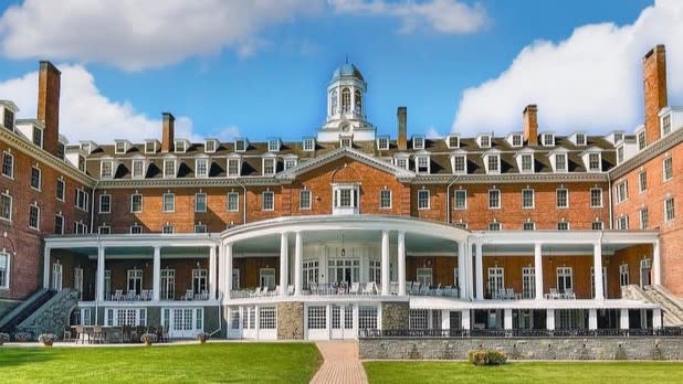 Exterior of the Otesaga Resort on a sunny day in Central New York