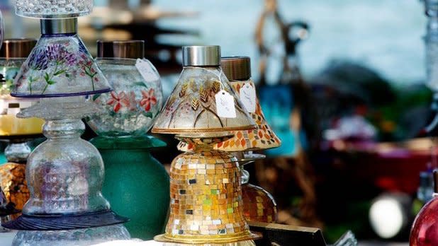 Close up of small antique lamps for sale