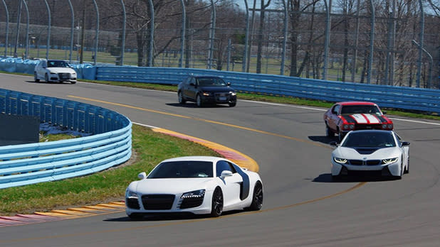 Cars race around the track at Watkins Glen International Speedway