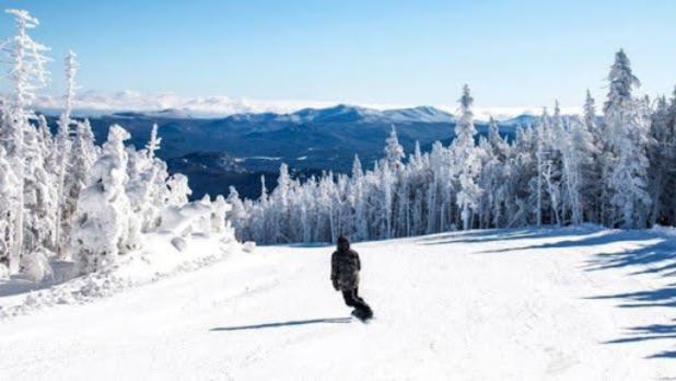 Snowboarder goes down whiteface mountain
