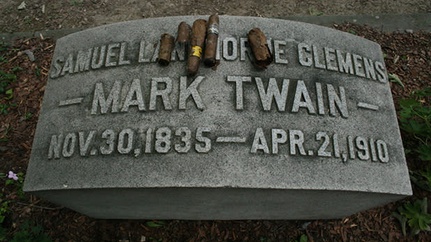 Cigars lay on top of the gravesite of Mark Twain at Woodlawn Cemetery of Elmira
