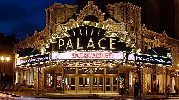 exterior of the Palace Theater illuminated at night