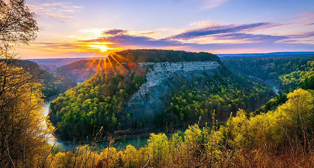 The sun setting over the hills and Genesee River at Letchworth State Park
