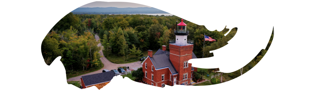 The red brick exterior of Big Bay Point Lighthouse in Big Bay