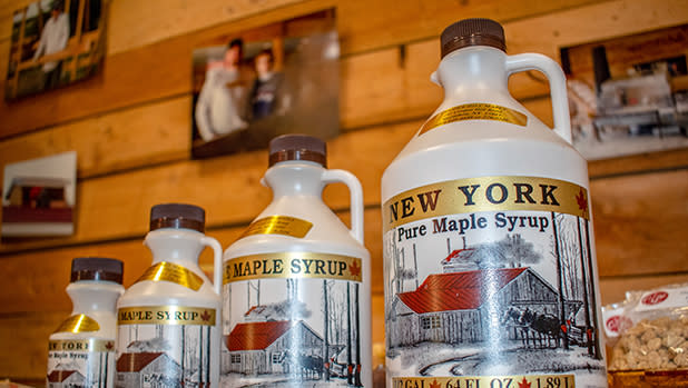 Jugs of pure maple syrup on display at Cooper Hill Maple