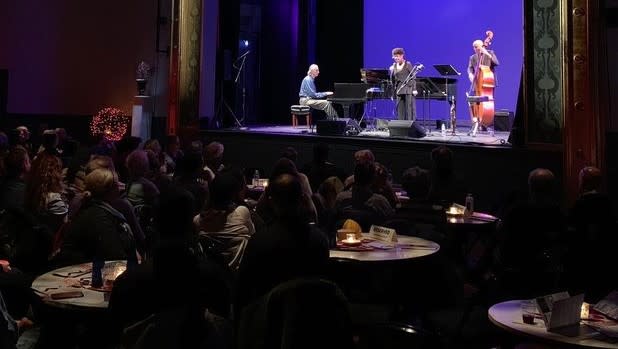 A jazz band plays on the stage at Hudson Hall