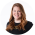 A headshot photo of Laura Connel smiling