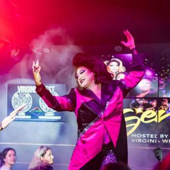 Drag queen performing at District West