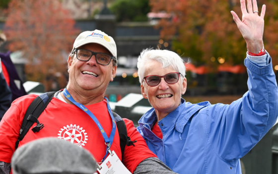 Group of Rotary members posing outdoors in Melbourne