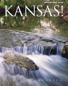 magazine cover that has the word KANSAS! across the top. In image is a long exposure capture of water flowing over rocks in a stream.