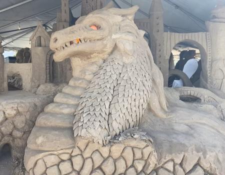 Dragon sandsculpture with glowing red eyes