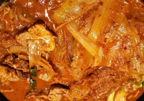 cooked meat and cabbage