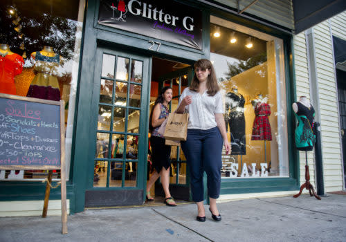 woman walking out of store